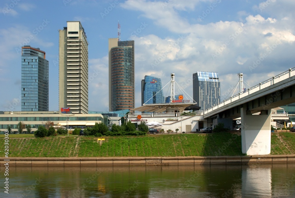 The Vilnius city walking bridge with skyscrapers