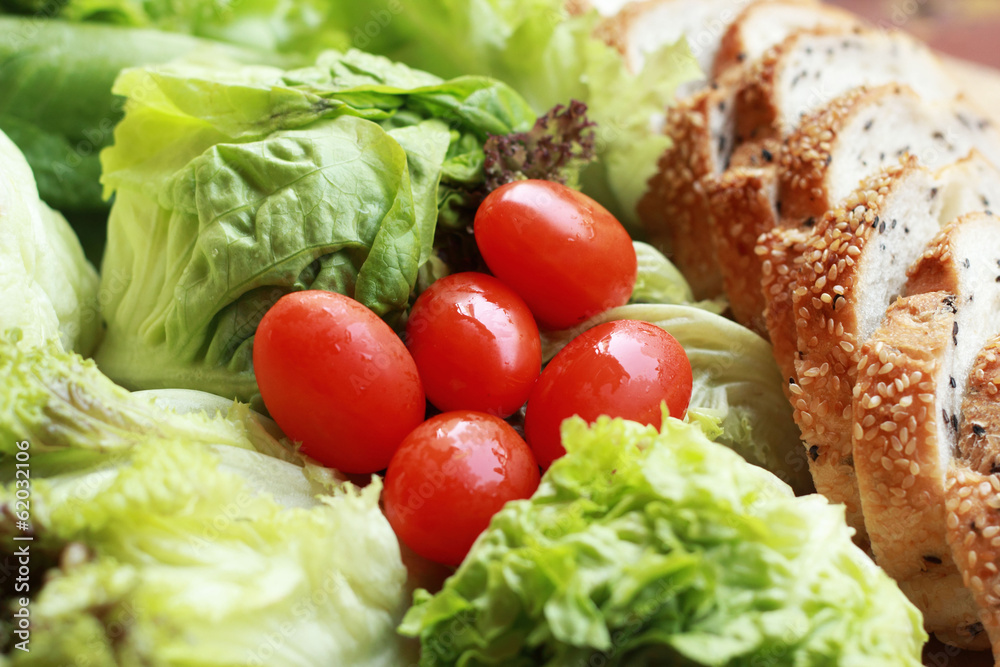 bread sprinkled with sesame -  vegetable green salad