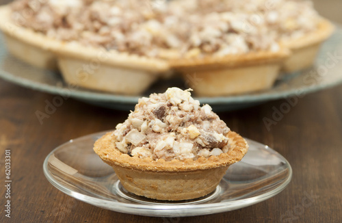 Tuna salad with egg, onions and mayonnaise  in tartlets.