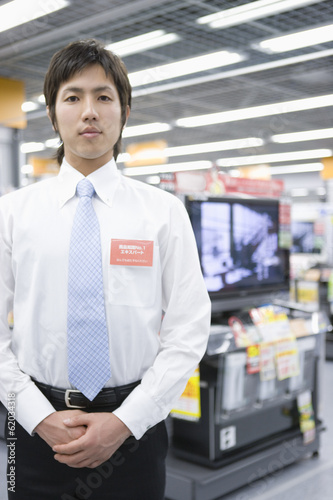 male salesclerk of an electrical appliance shop