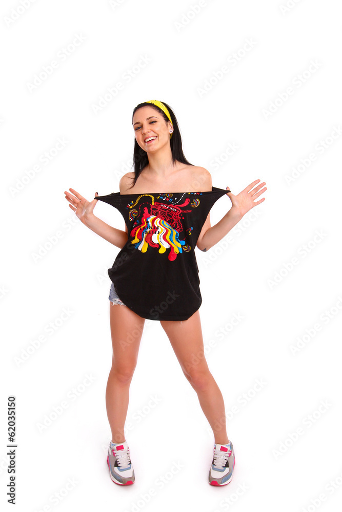 Rock girl with tattoos posing on a white background