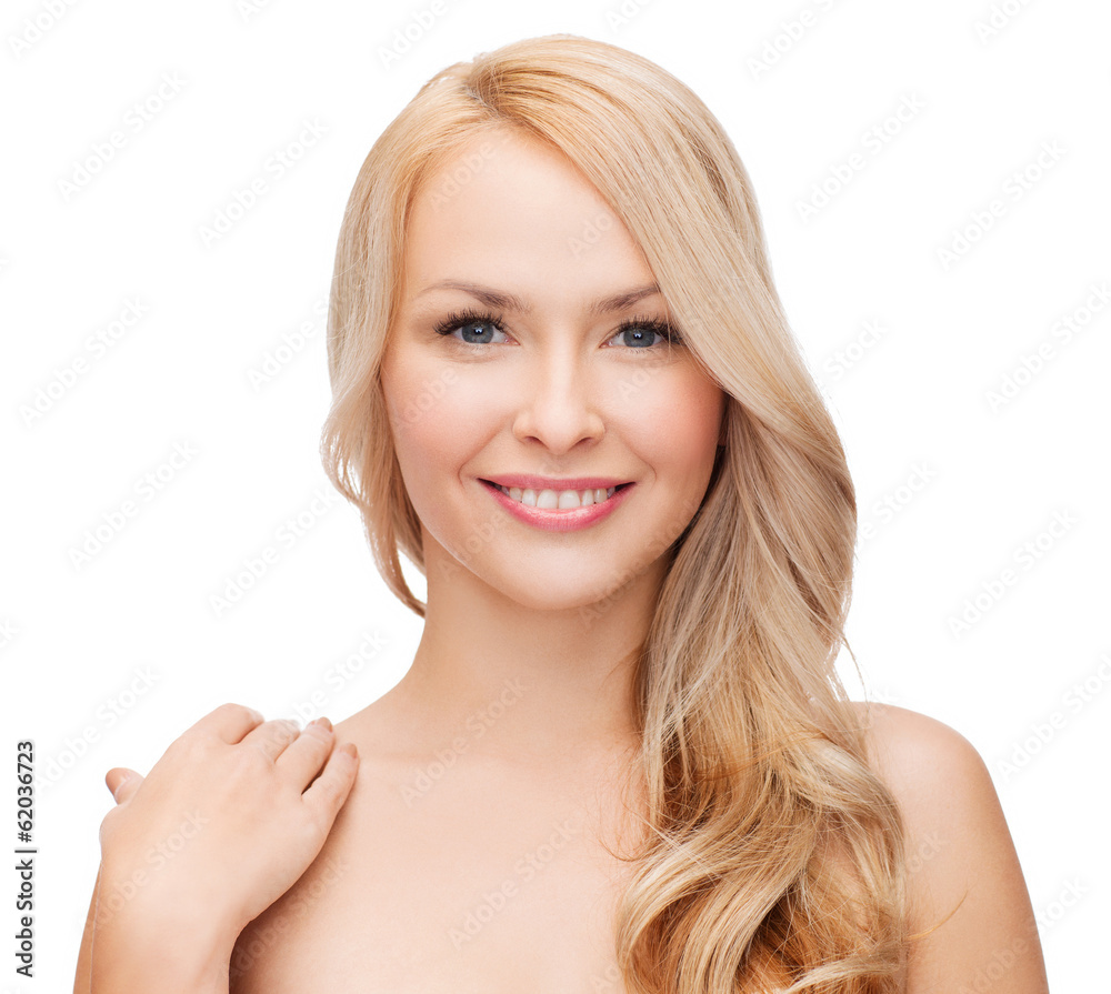 face and shoulders of happy woman with long hair face and shoulders of happy woman with long hair