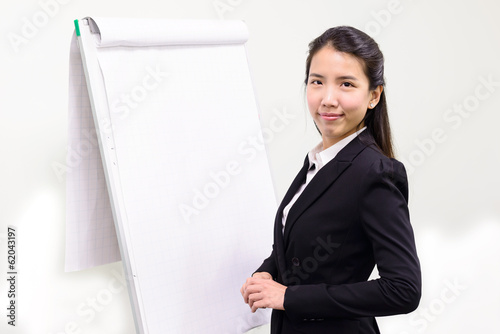 Thai business woman presenting on her flip board