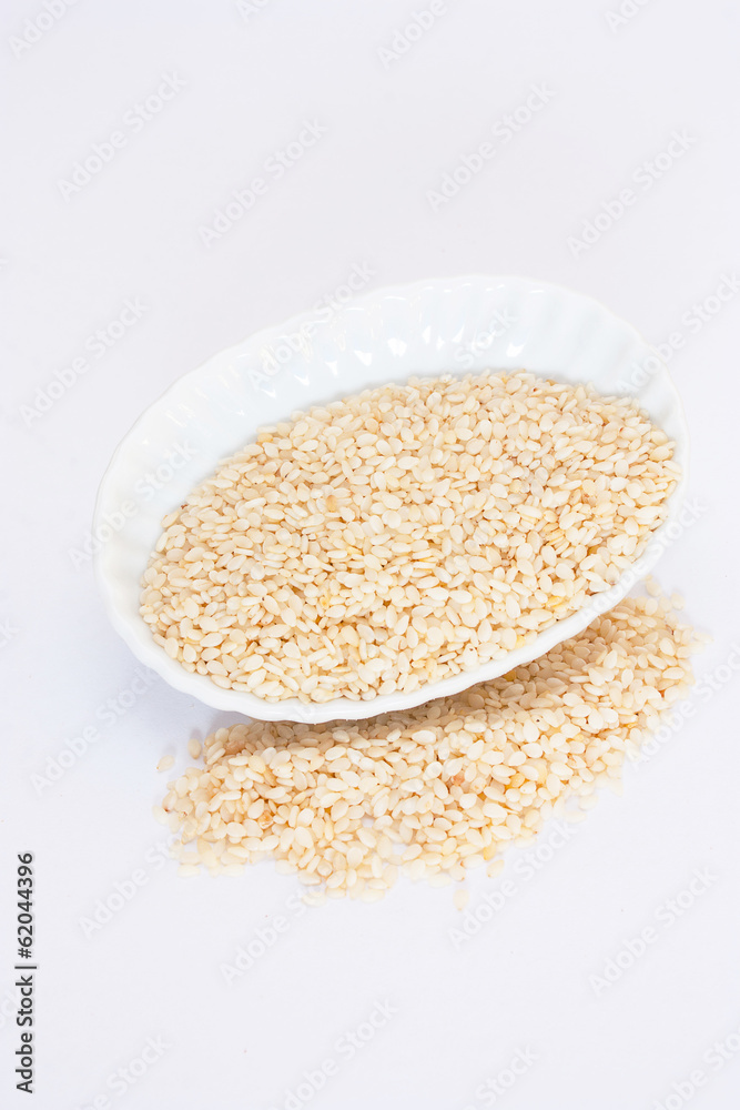 sesame seeds on a white background. sesame seeds on a white background.