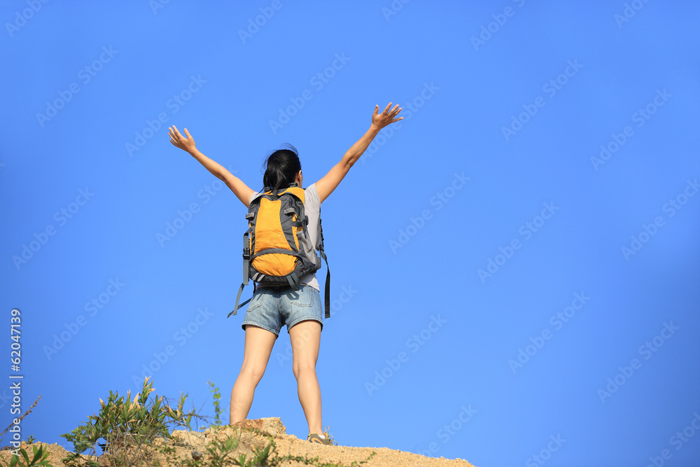 cheering hiking woman open arms desert mountain peak cheering hiking woman open arms desert mountain peak