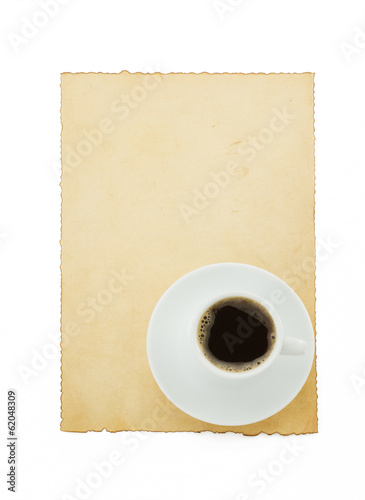 cup of coffee and parchment on white