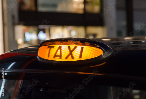 Closeup to a Taxi Sign