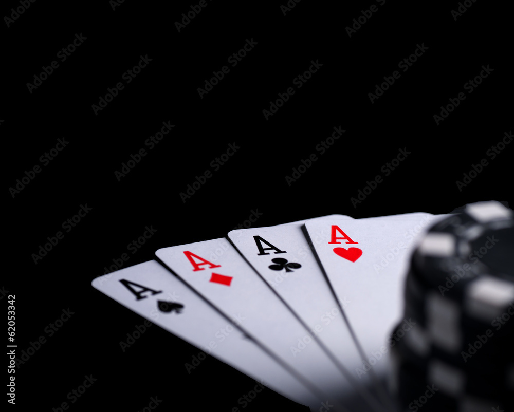 Obraz premium four aces on black table with chips