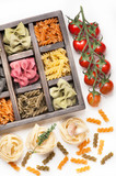Assorted Italian pasta tomatoes in  wooden box
