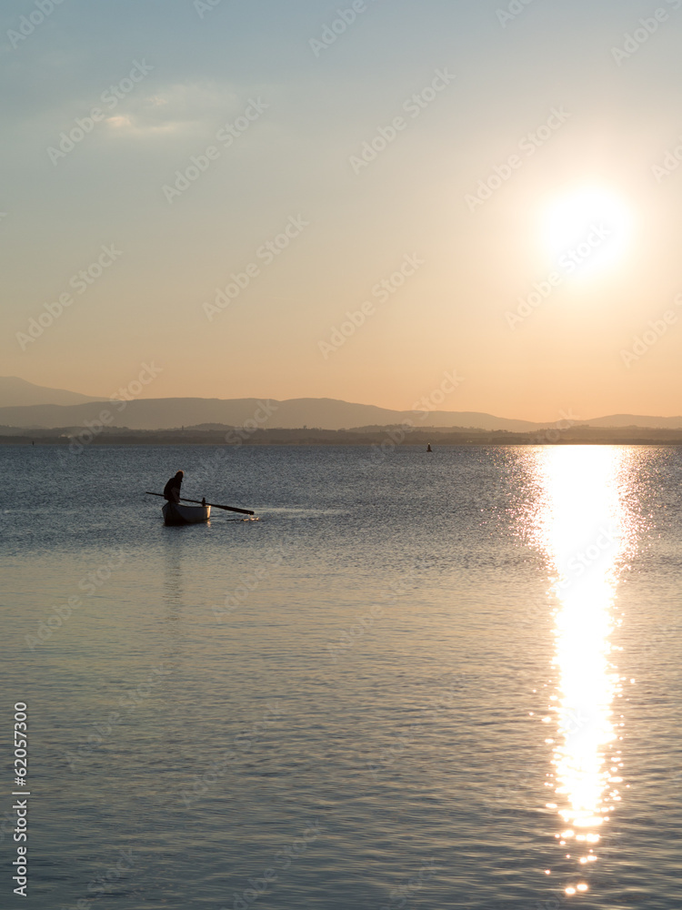 Fisherman on the Lake at Dusk