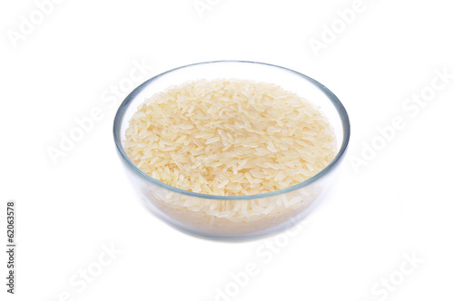 Brown rice in glass jar macro close up