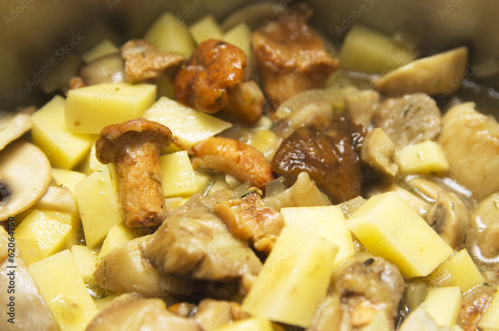 mushroom chanterelle soup in saucepan, close-up mushroom chanterelle soup in saucepan, close-up