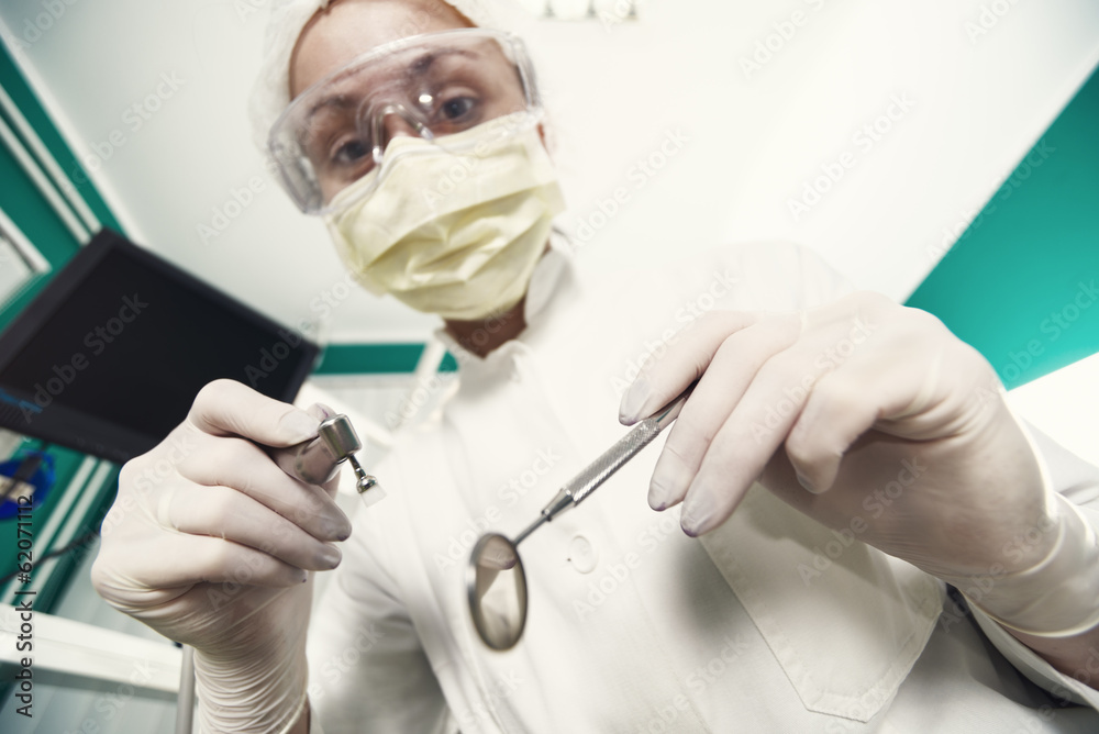 Dentist working from perspective of patient Dentist working from perspective of patient