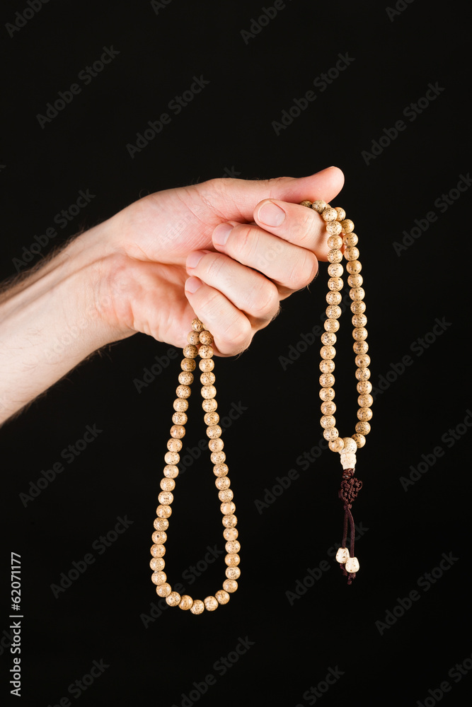 Hand praying with chain Hand praying with chain