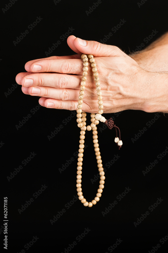 Hand praying with chain Hand praying with chain