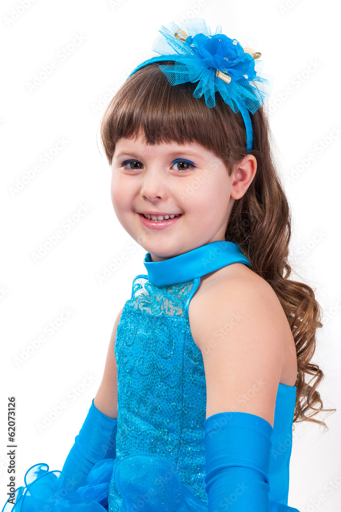 Portrait of cute smiling little girl in princess dress