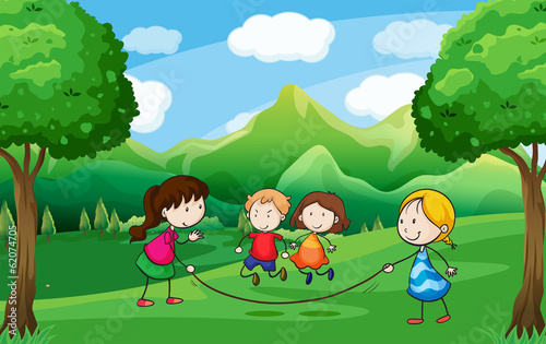 Four kids playing outdoor near the trees