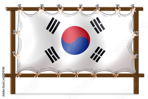 A wooden frame with the flag of Korea