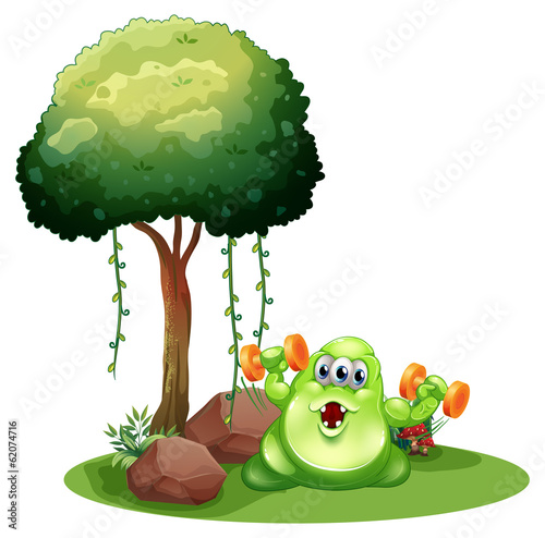 A fat green monster with a barbell exercising near the tree