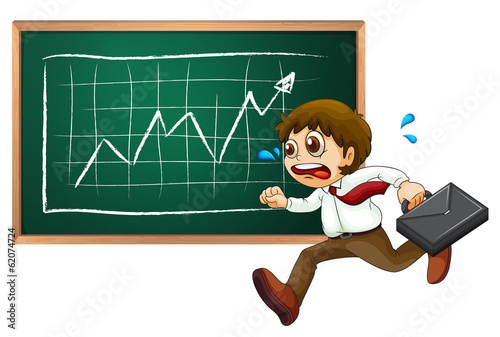 A businessman running hurriedly in front of the blackboard