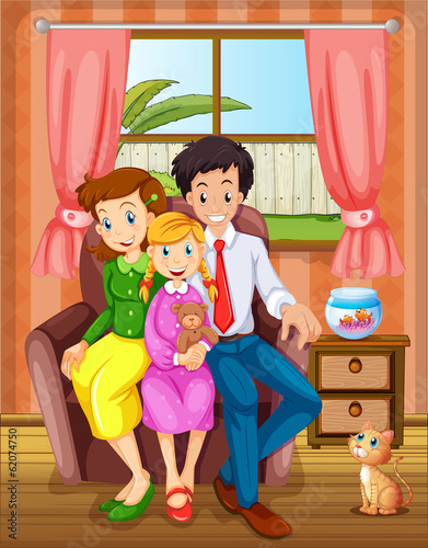 A smiling family inside the house
