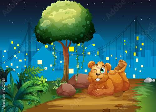 A happy brown bear at the pathway