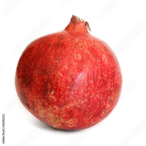 Ripe juicy pomergranate isolated on white background photo