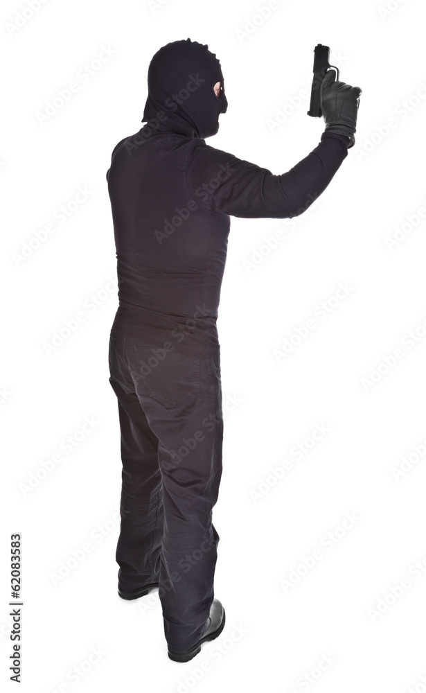 Profile of thief with gun Profile of thief with gun