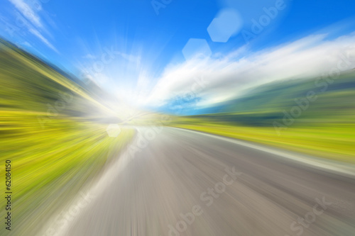 road in the mountains, a blurred image with sunlight