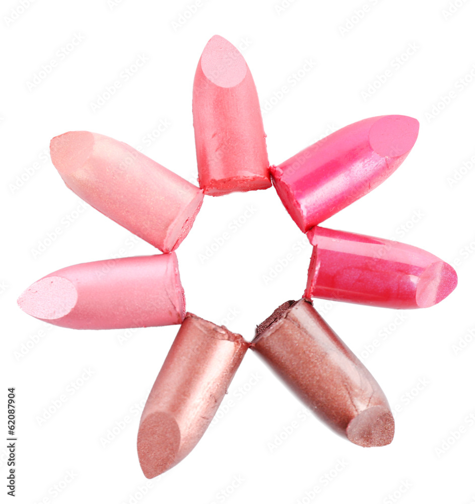 Several different lipsticks isolated on white Several different lipsticks isolated on white