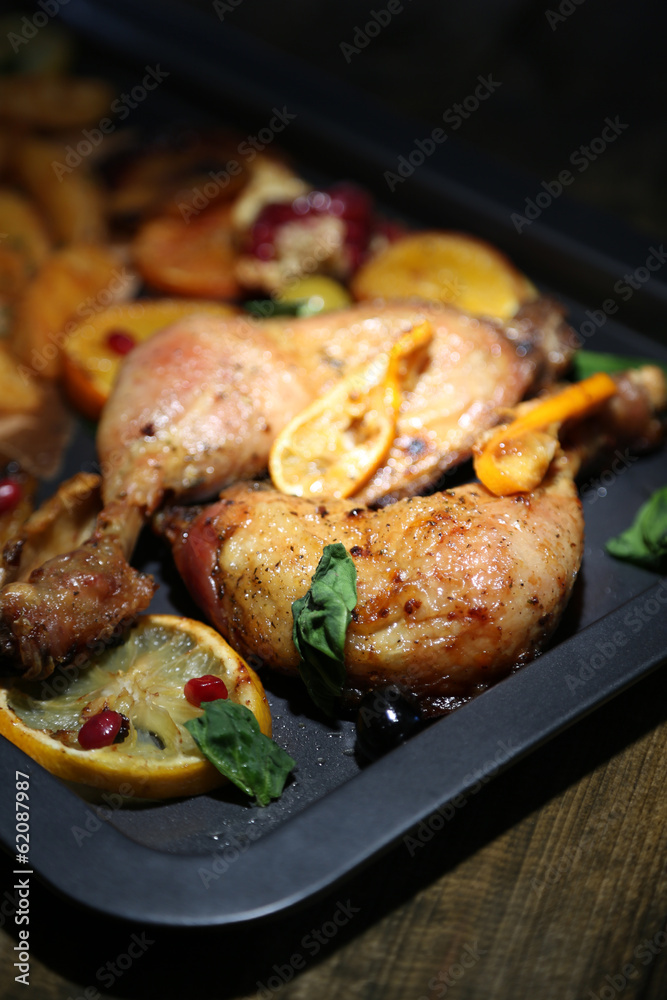 Homemade roasted chicken drumsticks with fried potatoes and Homemade roasted chicken drumsticks with fried potatoes and