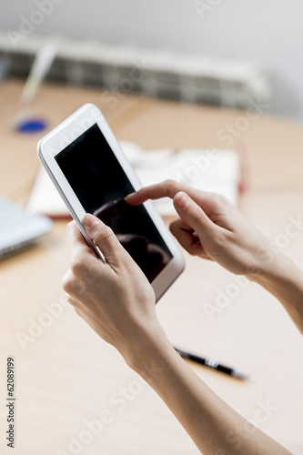 Woman working on a tablet