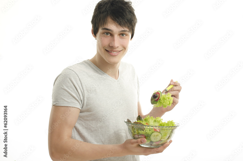 Man eating organic green salad for a healthy life Man eating organic green salad for a healthy life