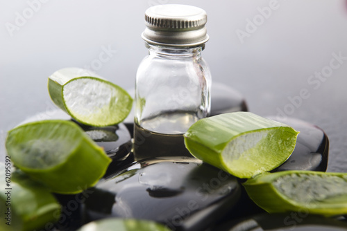 Sliced aloe leaves with oil on the stone
