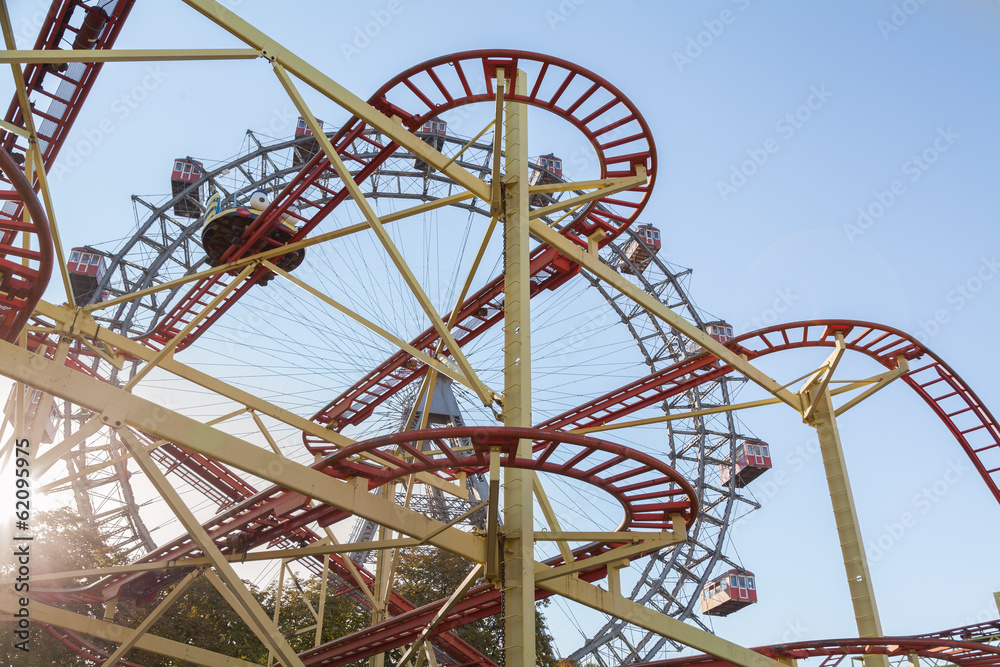 Ferris Wheel and Roller Coaster in Vienna, Austria.