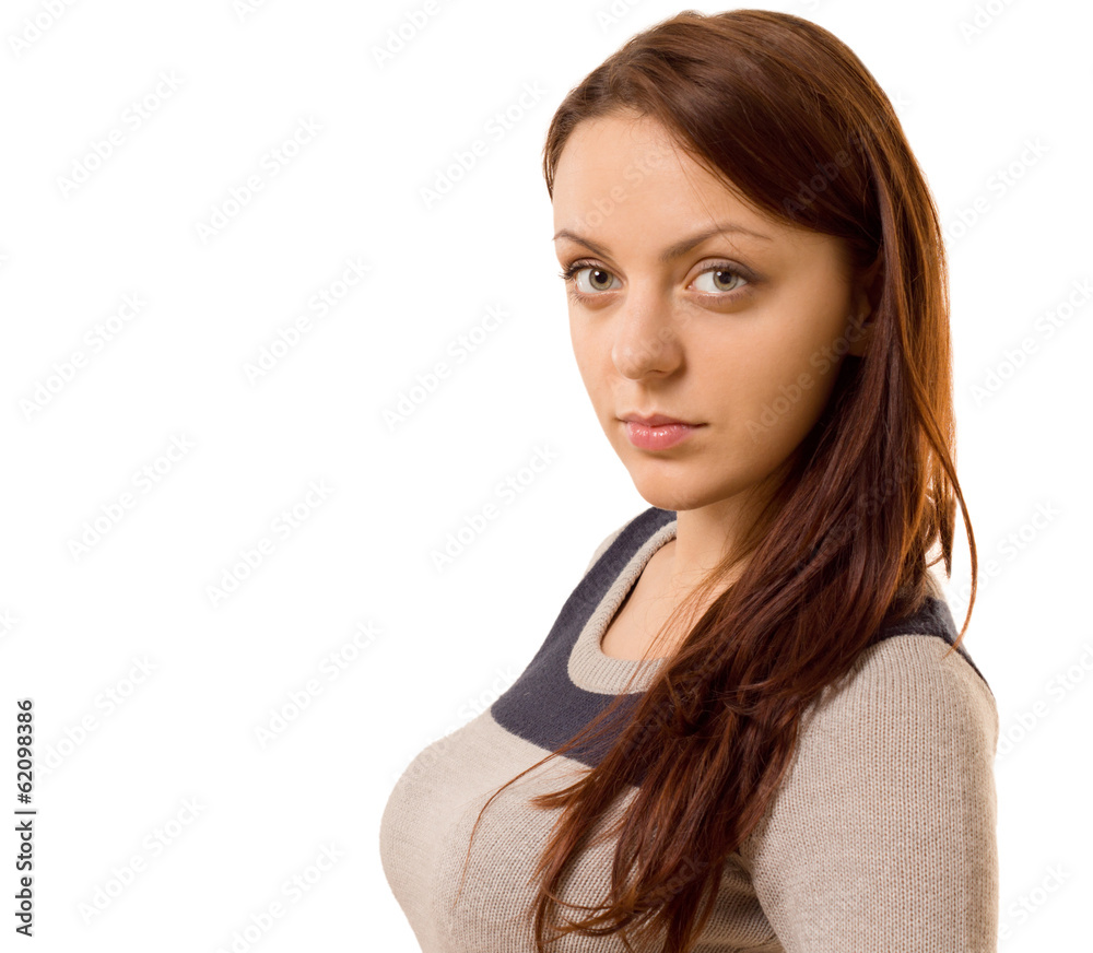 Young woman raising an eyebrow at the camera Young woman raising an eyebrow at the camera