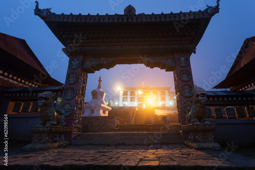 Gate of the Tengboche monastery at night photo