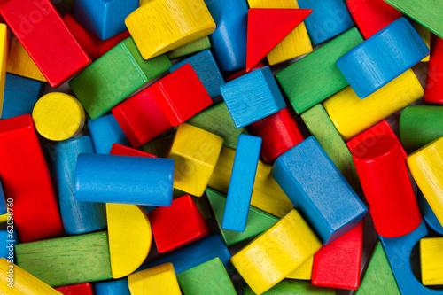 Toys blocks, multicolor wooden building bricks, colorful heap