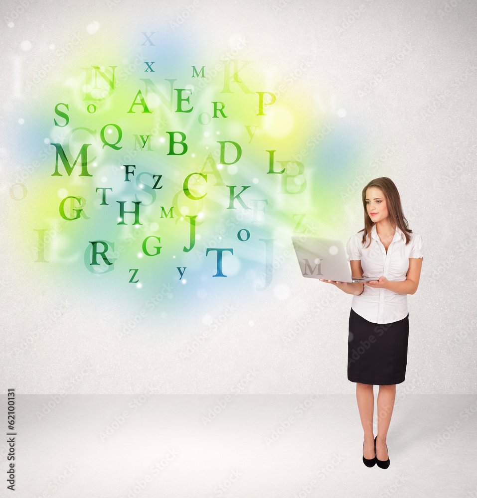 Business women with glowing letter concept