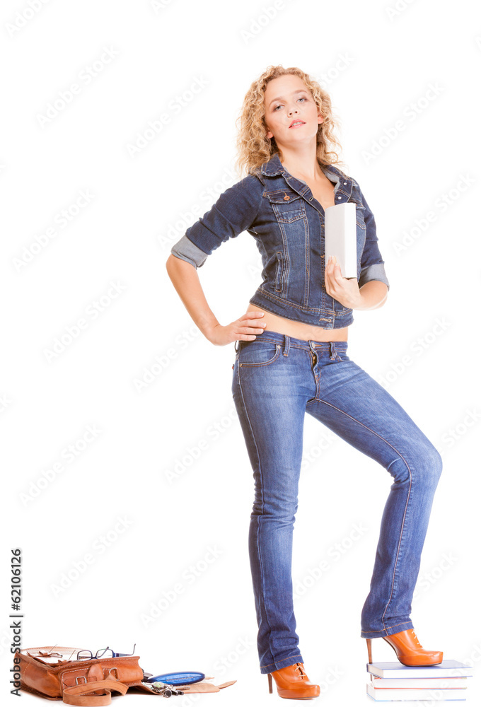 Denim fashion. Full length student girl in blue jeans bag books Denim fashion. Full length student girl in blue jeans bag books