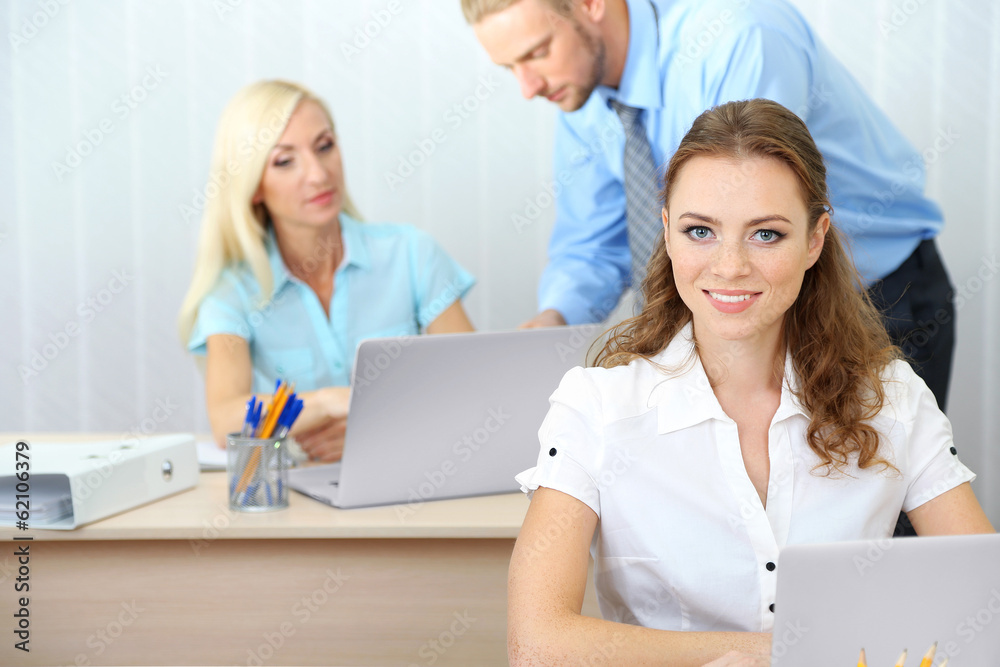 Office workers in workplace Office workers in workplace