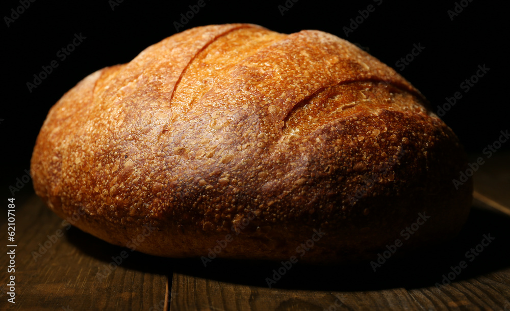 Loaf of bread on dark background Loaf of bread on dark background