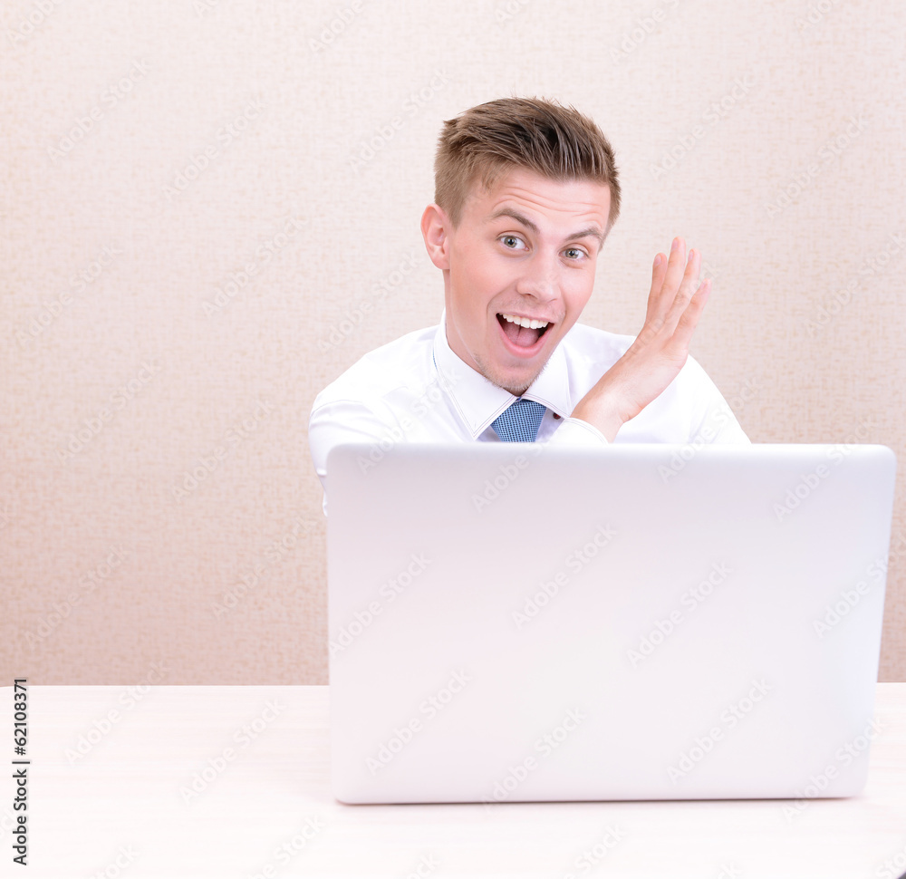 Successful young businessman working at office Successful young businessman working at office