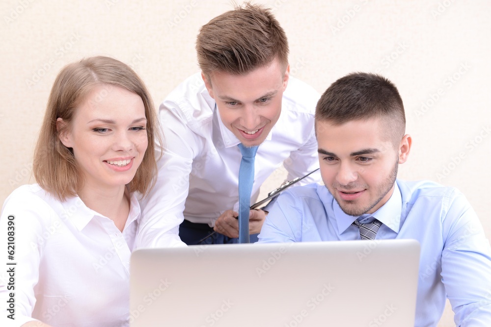 Successful young businesspeople working at office Successful young businesspeople working at office
