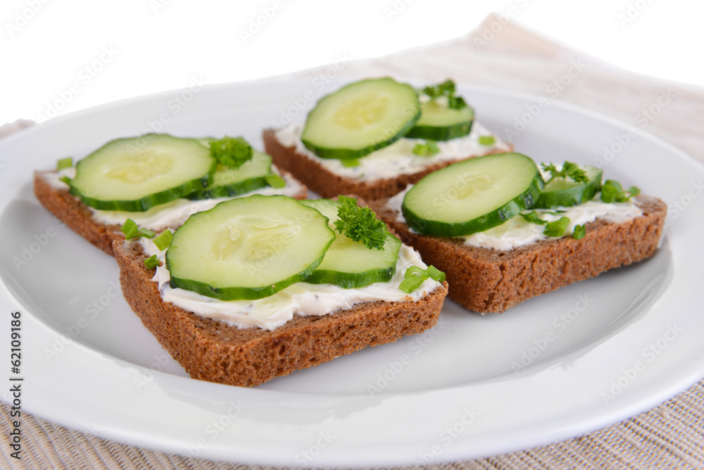 Delicious canapes on plate close-up