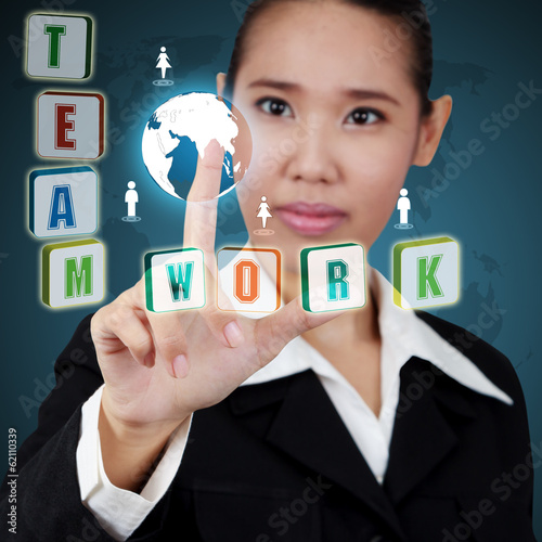 Business woman showing teamwork concept. Concept of business suc photo