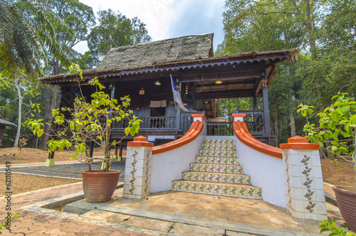 Traditional malay wooden house photo