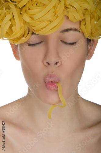 Obraz na plátně Woman with closed eyes eat pasta