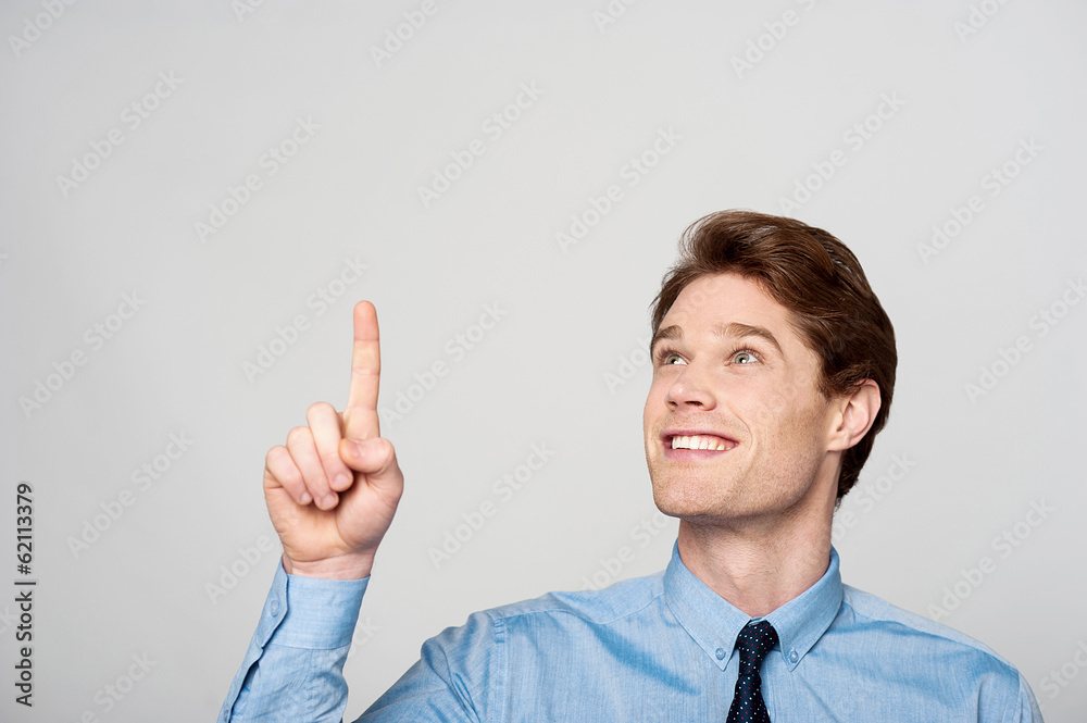 Business man pointing up Business man pointing up