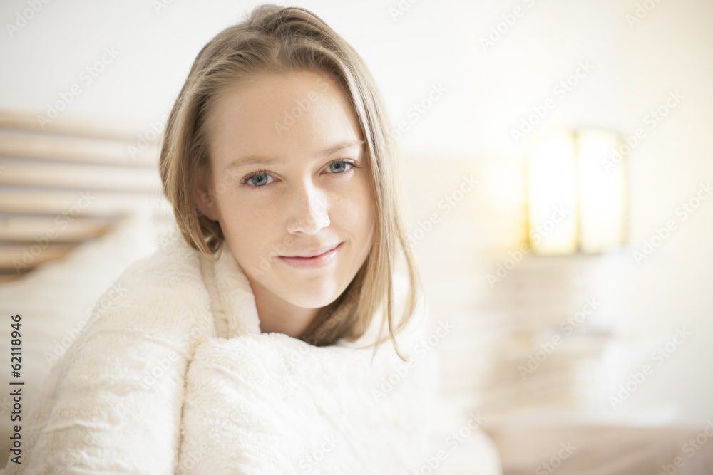 portrait of a beautiful young woman in her bedroom portrait of a beautiful young woman in her bedroom